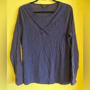 Purple long sleeve top with a V-neck and sheer panel.  Size X 14/16.